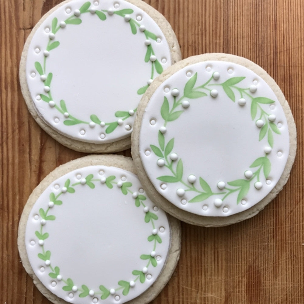 cookies featuring our Vine Wreaths Round Cookie Stencil Set by Designer Stencils