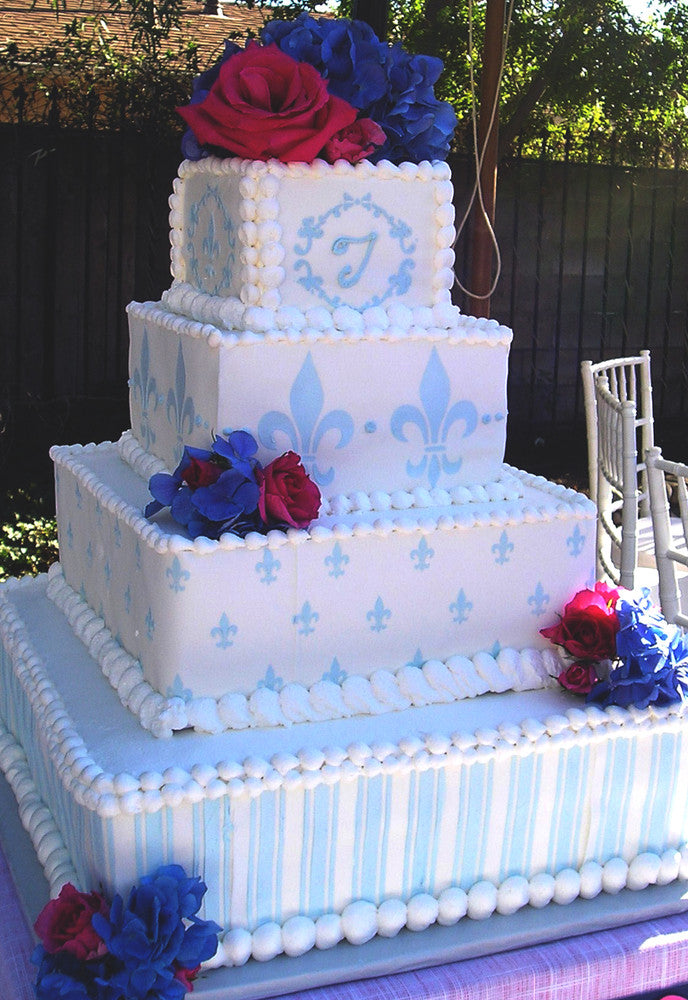 large multi-tiered wedding cake using Fleur de Lis Cake Stencil by Designer Stencils