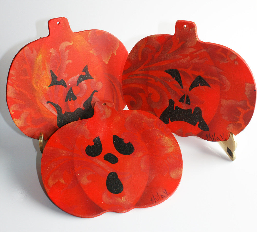 Jack-O-Lantern Halloween Faces Cookie Stencil Set with spooky pumpkin designs, ideal for cake decorating.