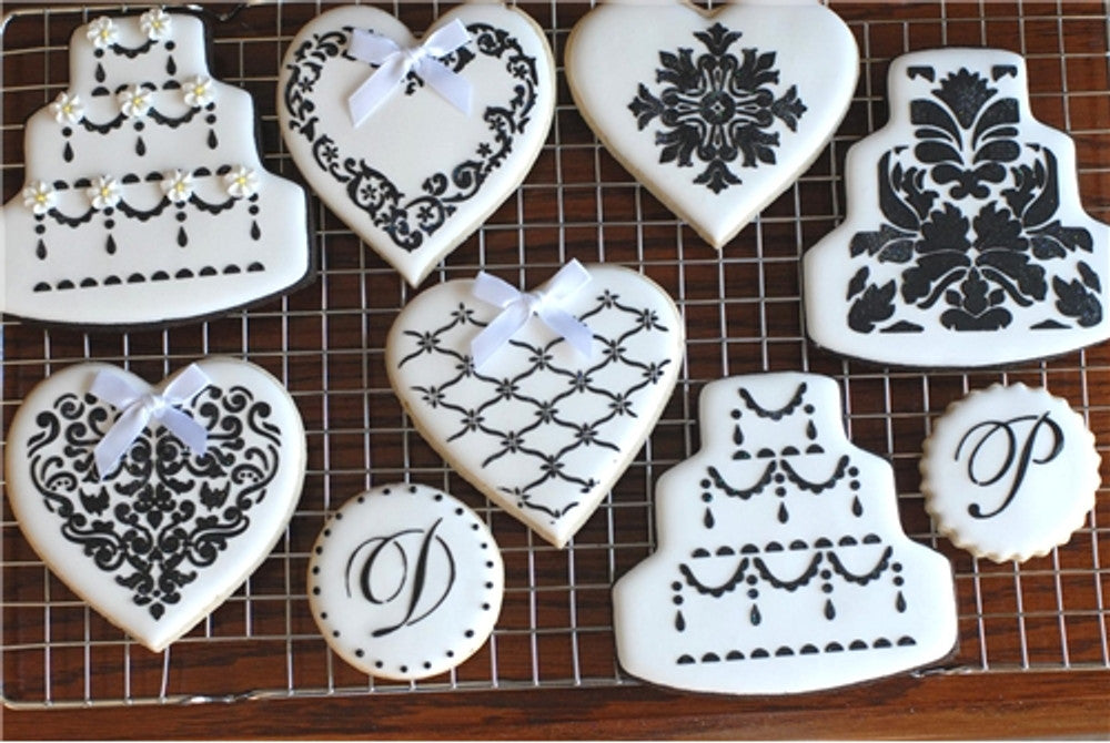 Cookies decorated using the Swirl Valentine Heart Cookie Stencil Set by Designer Stencils
