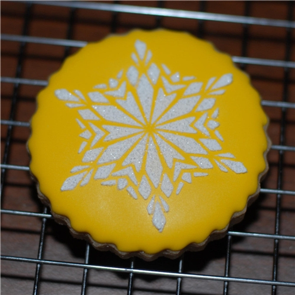 Cookie decorated with the Crystal Snowflakes 2 Cupcake and Cookie Stencil Set by Designer Stencils
