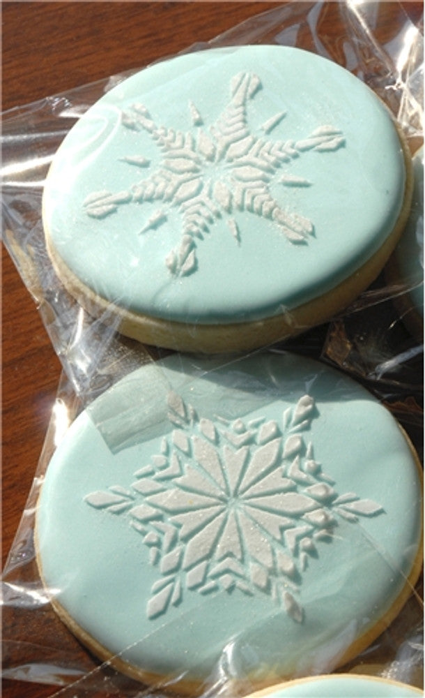 Cookie decorated with the Crystal Snowflakes 2 Cupcake and Cookie Stencil Set by Designer Stencils