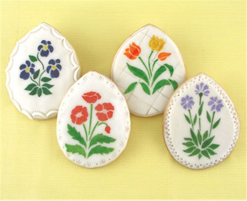 Spring Garden Cookie Stencil Set featuring colorful flower designs on decorated cookies for Easter and Mother's Day.