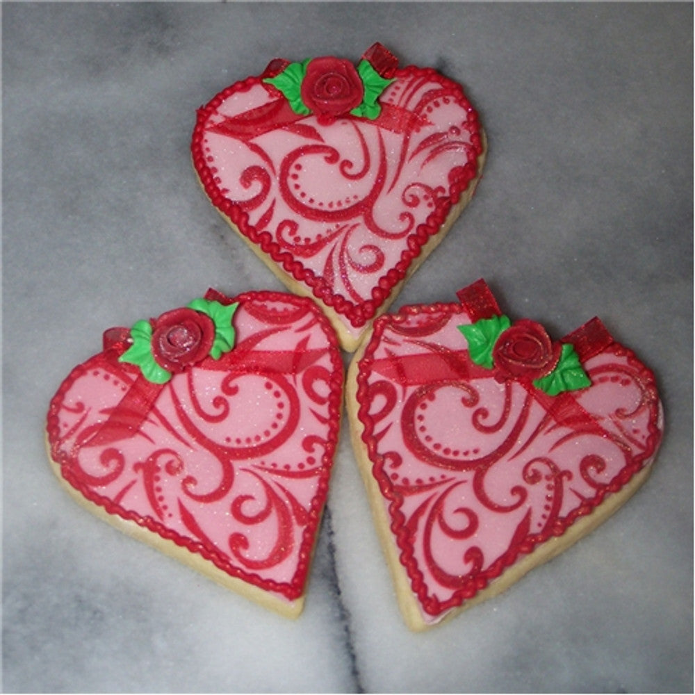 Cookies decorated for Valentine's Day using Contemporary Hearts Cookie Stencil Set by Designer Stencils