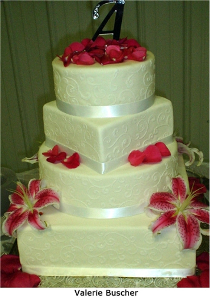 Leafy Scroll Cake Stencil Side by Designer Stencils applied to a wedding cake