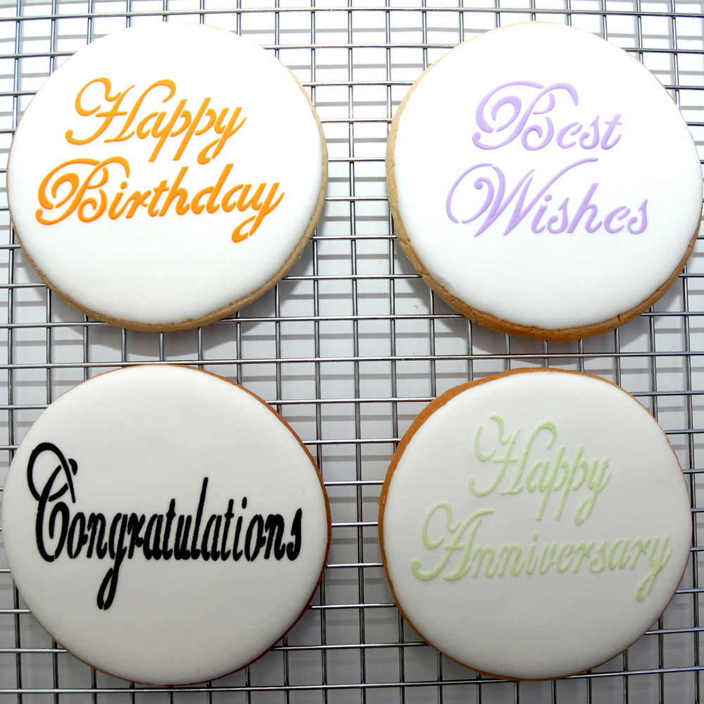Decorative cookies with stencils reading 'Happy Birthday', 'Best Wishes', 'Congratulations', and 'Happy Anniversary'.