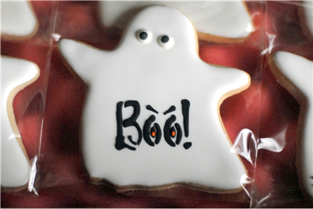 Halloween ghost cookie with 'Boo!' text, designed for festive celebrations and spooky treats.
