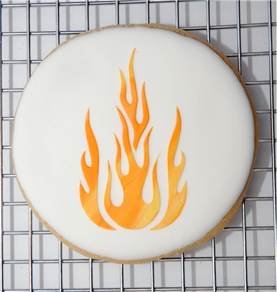 Flame design on a decorated cookie, showcasing vibrant orange and yellow icing details.