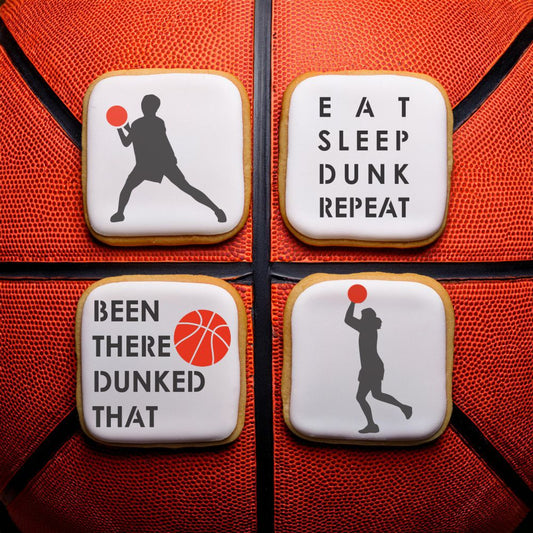 Decorative cookies featuring basketball themes and phrases like 'Eat Sleep Dunk Repeat' and silhouettes of players.