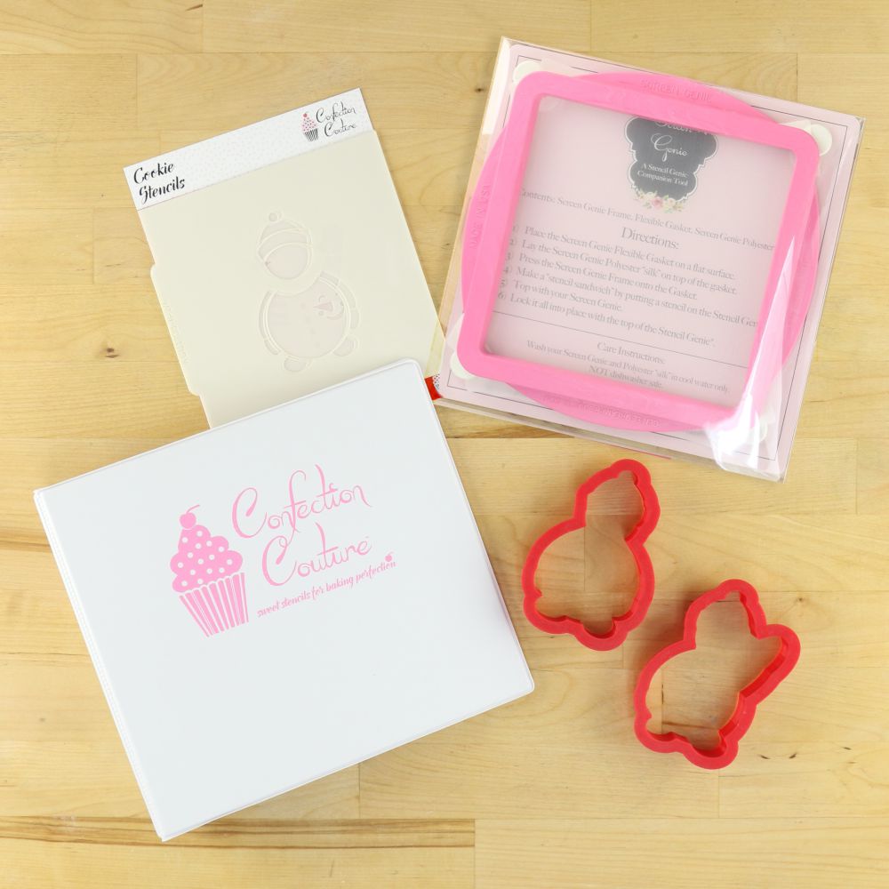 Snowman Holiday Project Box with cookie cutters and stencils for creating decorated Christmas cookies.