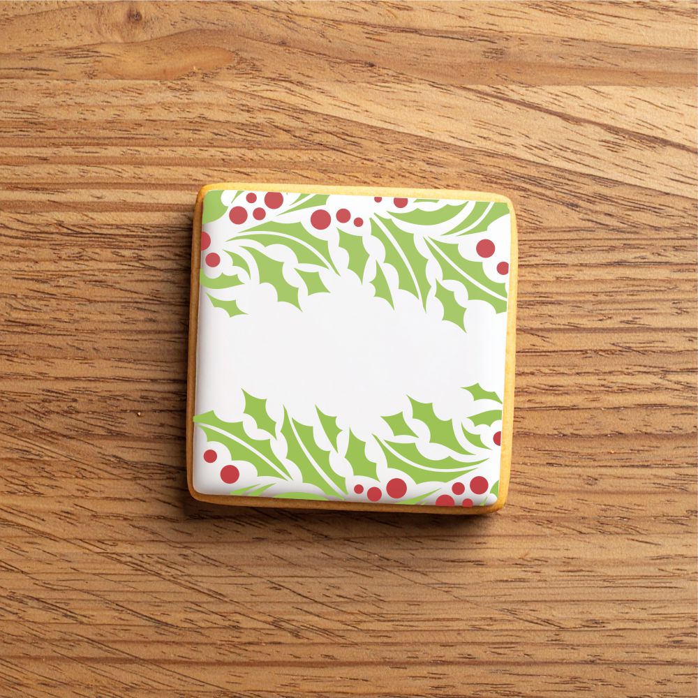 Cookie decorated using the Holly Branch Cookie Stencil Edger & Border