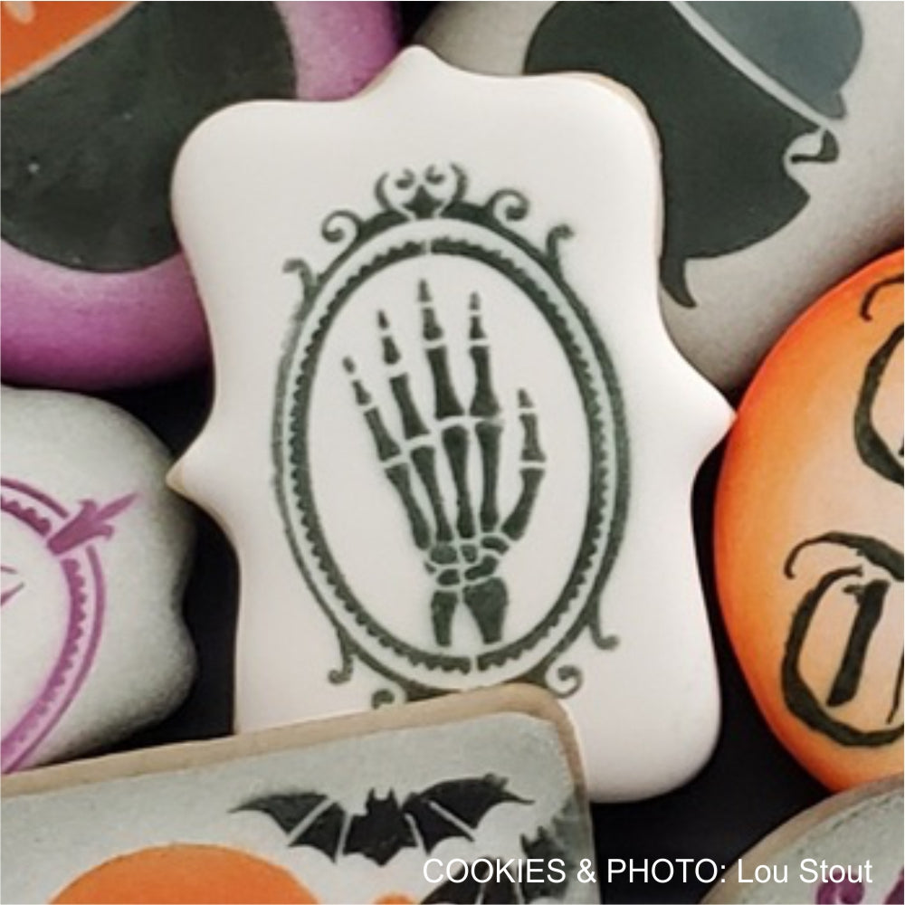airbrushed cookie using Halloween Stencils wishing you a haunted night cookie stencil by Lou Stout