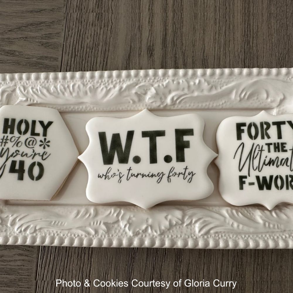 Cookies airbrushed by Gloria Curry using 40th birthday cookie stencils from Confection Couture