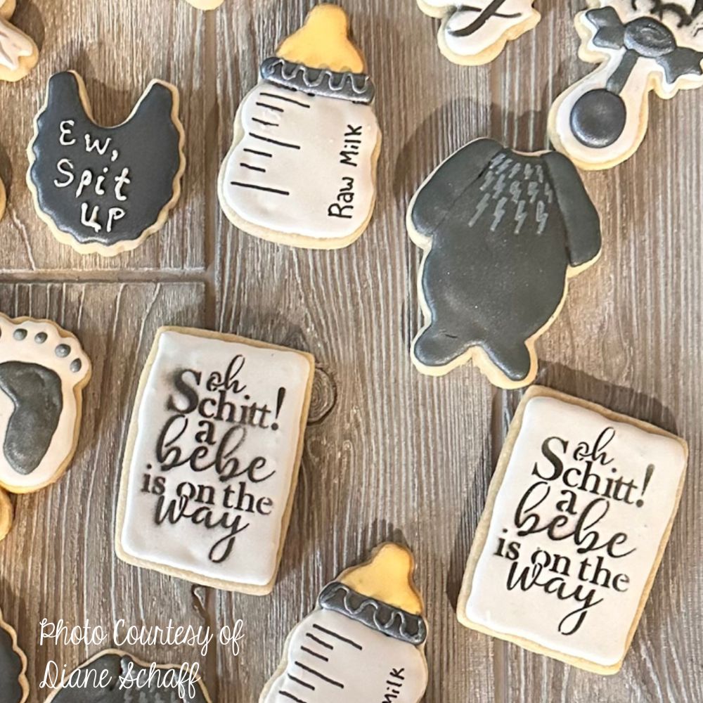 A Bebe On They Way Cookie Stencil Set Used on Cookies for a Baby Shower