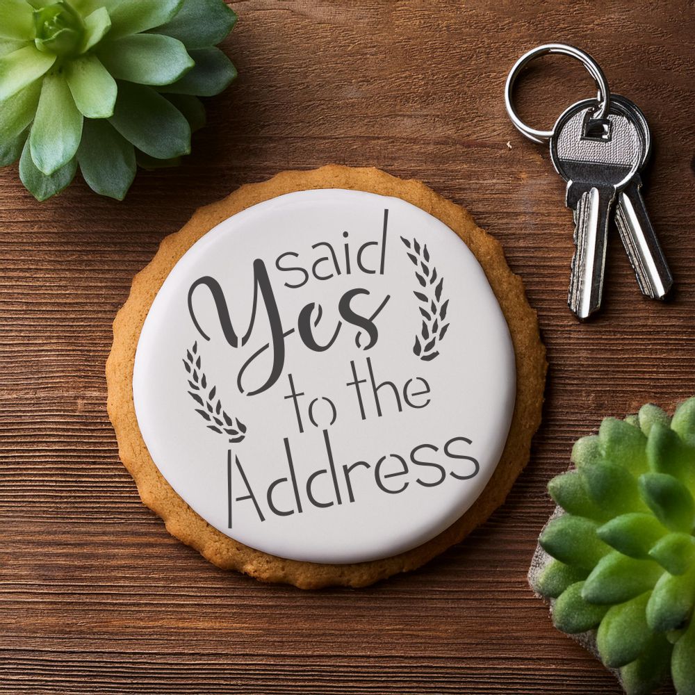 Yes to the Address Housewarming Cookie Stencil applied to a cookie