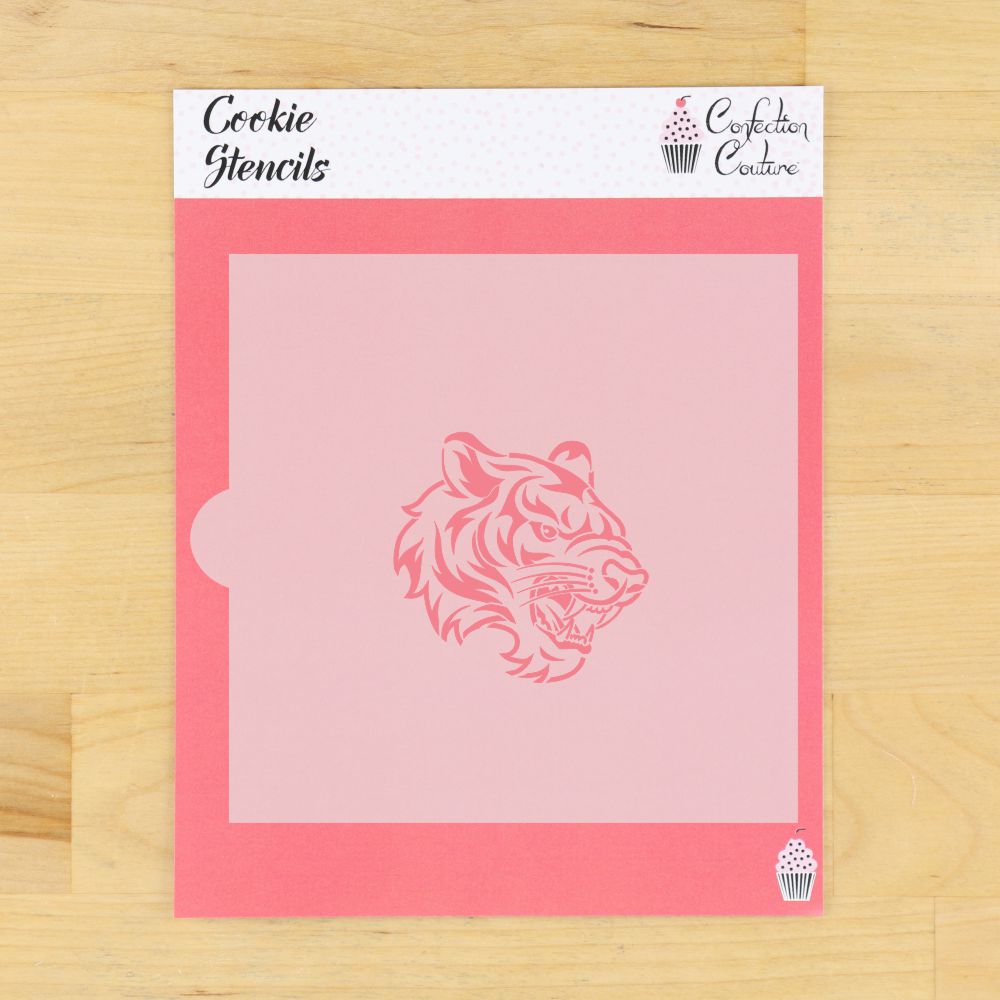 Tiger mascot cookie stencil on a pink background for team-themed baking and cookie decorating.