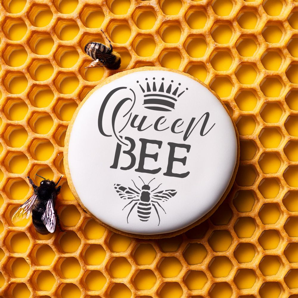 Queen Bee cookie with bee design on honeycomb background, perfect for birthdays and celebrations, featuring a stencil.