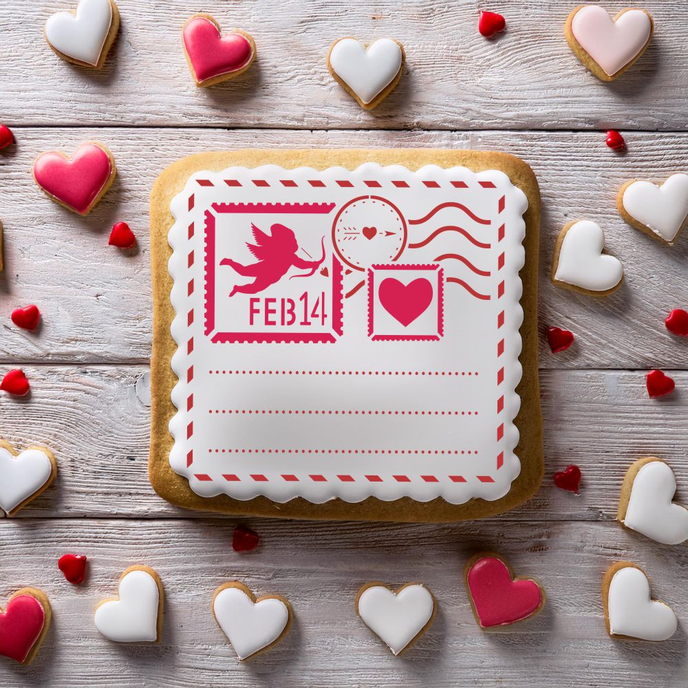 Love Letter Valentine Cookie Stencil design on a square cookie surrounded by heart-shaped cookies for Valentine's Day.