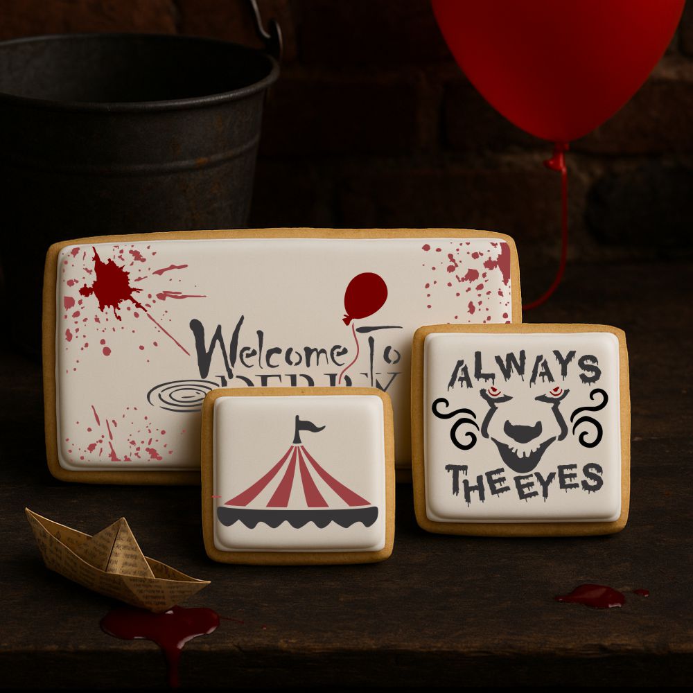 Decorative cookies with IT-Welcome to Derry themed designs applied to the top of white icing.