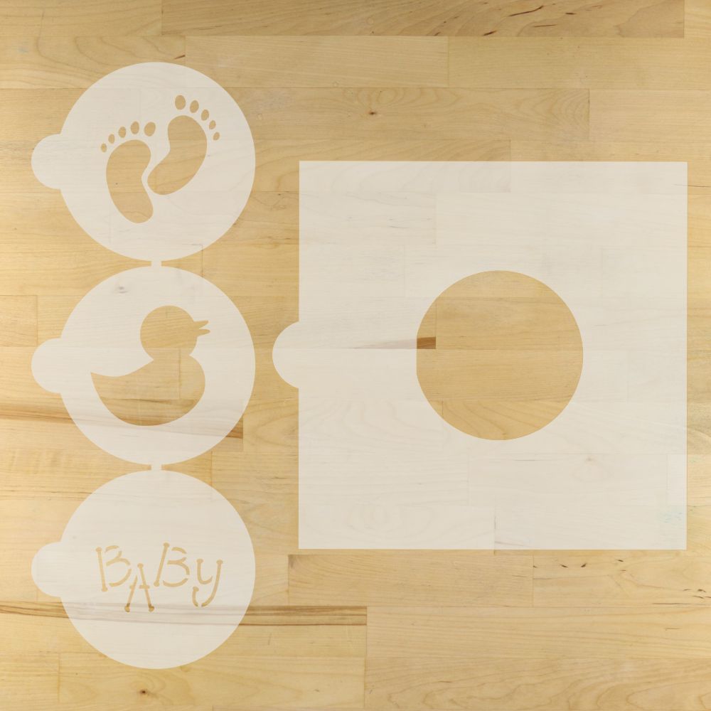 Stencils with footprints, duck, and 'Baby' on a wooden surface