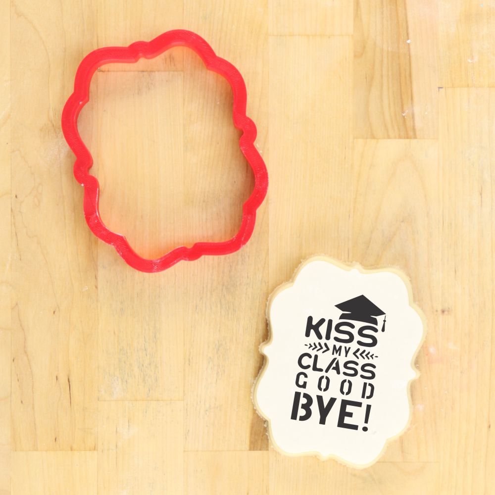 Mockup of Kiss My Class Goodbye with the Andover Plaque Cookie Cutter