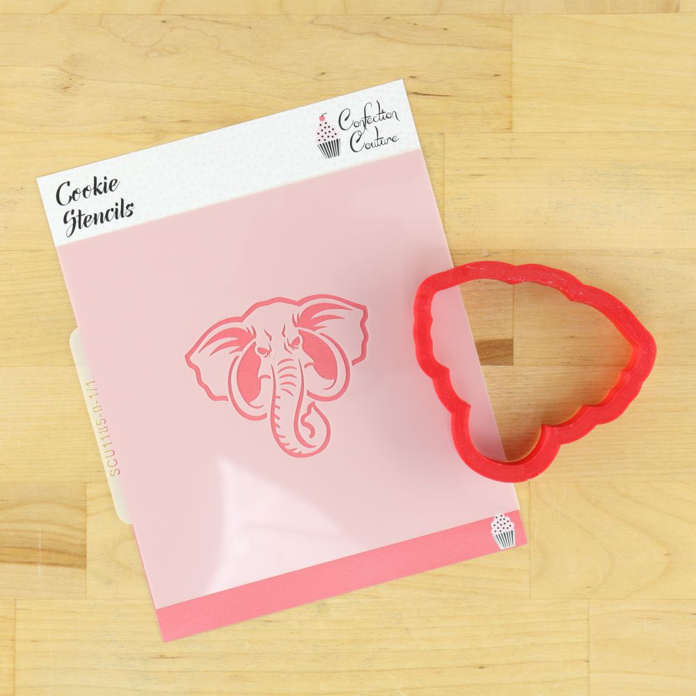 Elephant mascot cookie stencil packaging with matching cookie cutter on a wooden surface.