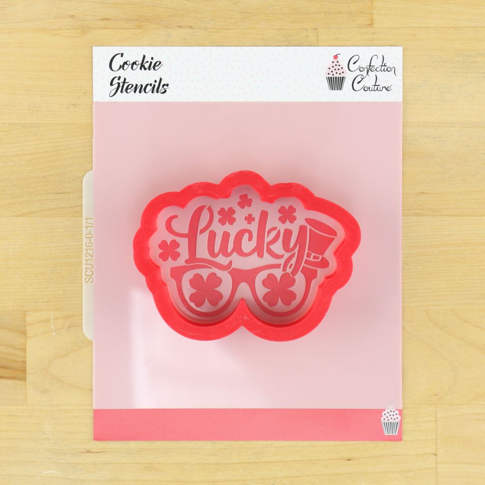 St. Patrick's Day cookie stencil featuring 'Lucky' text and sunglasses design for festive baking.