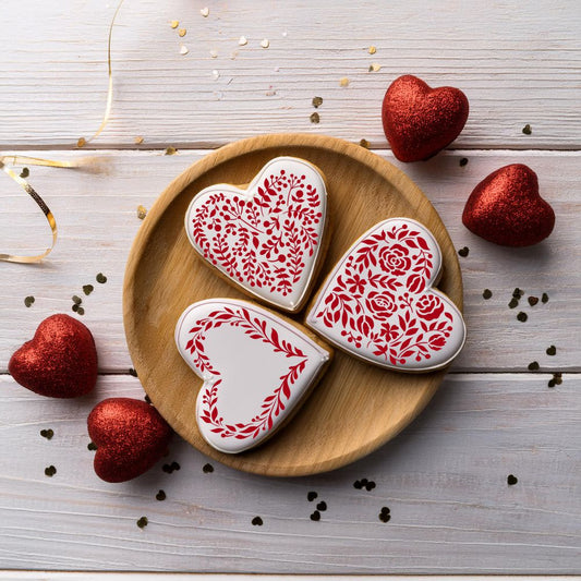 Heart cookies decorated using Vintage Hearts Cookie Stencil Set by Designer Stencils