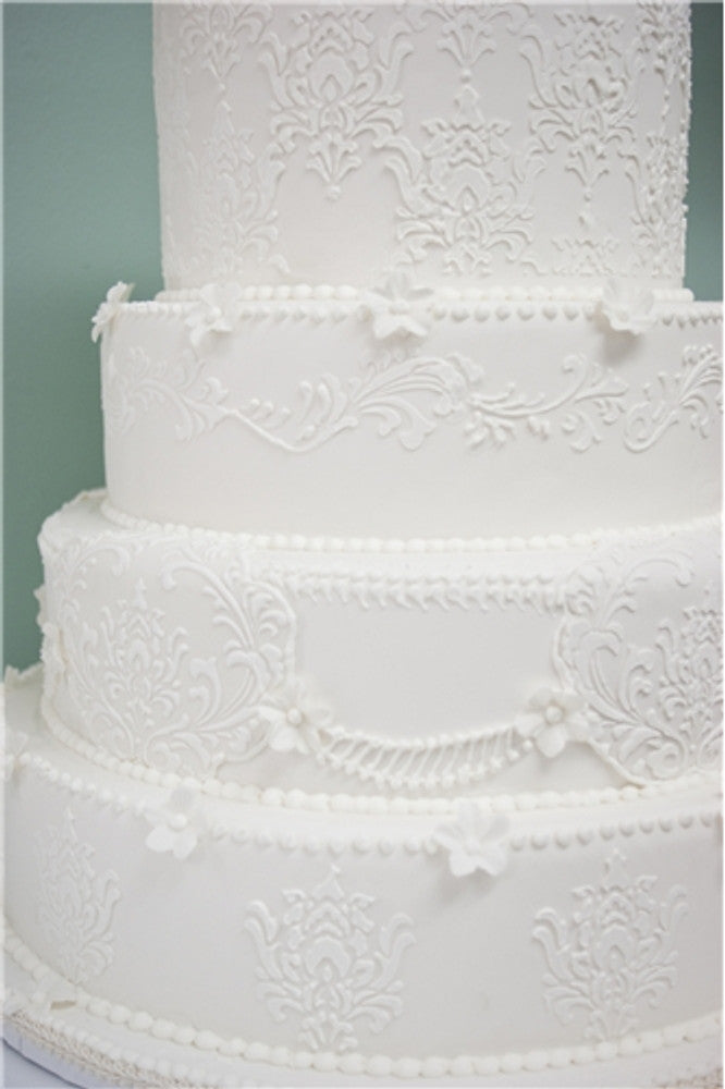 WEDDING CAKE DECORATED WITH THE Filigree Damask Cake Stencils by Designer Stencils
