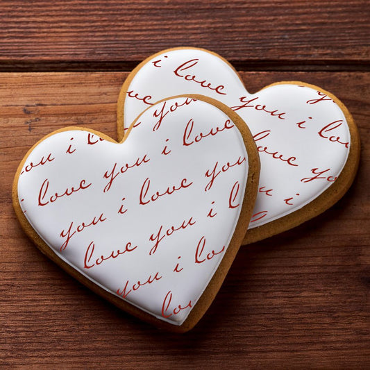 Heart cookies decorated using the I Love You Cookie Stencil by Designer Stencils