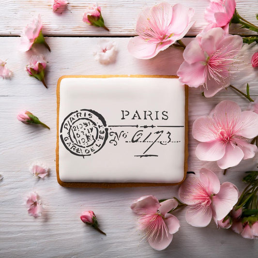 Cookie Decorated Using the Paris Postmark Cookie Stencil