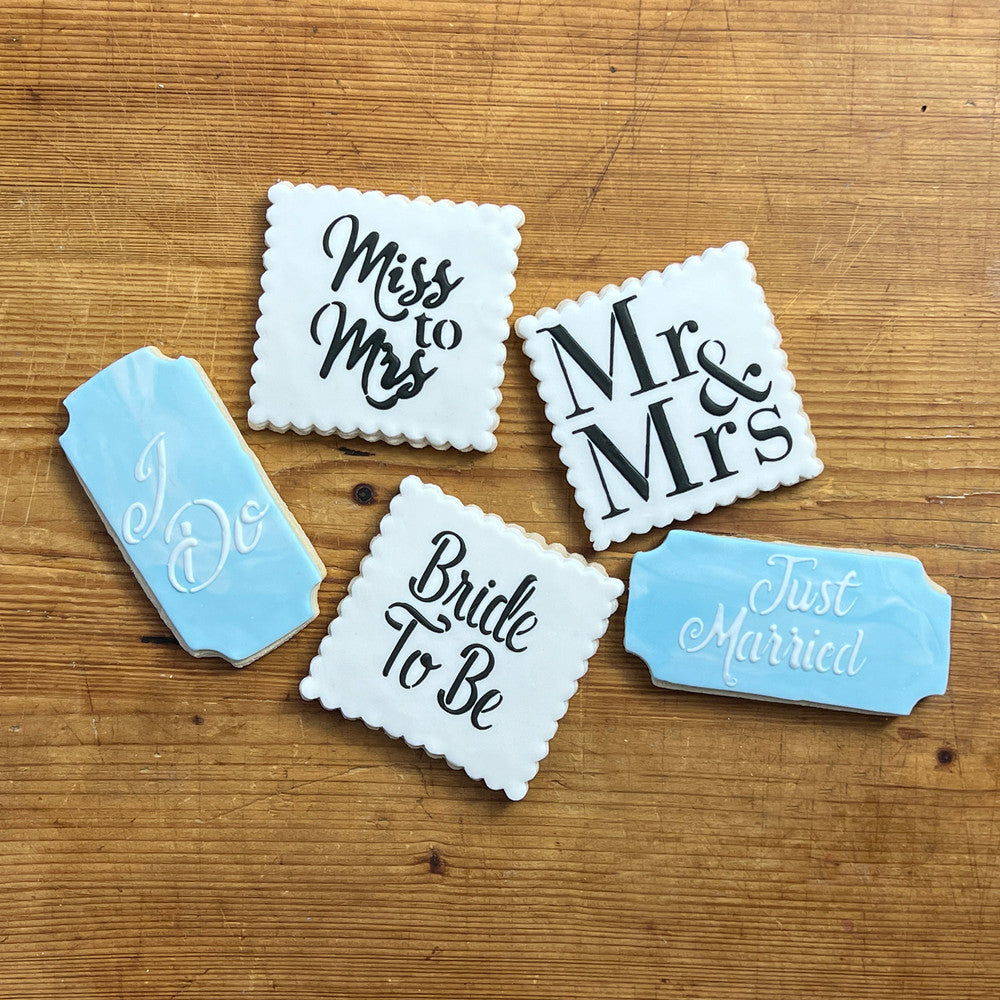 Set of wedding-themed cookies featuring 'Bride To Be', 'Mr & Mrs', 'Miss to Mrs', 'I Do', and 'Just Married' designs.