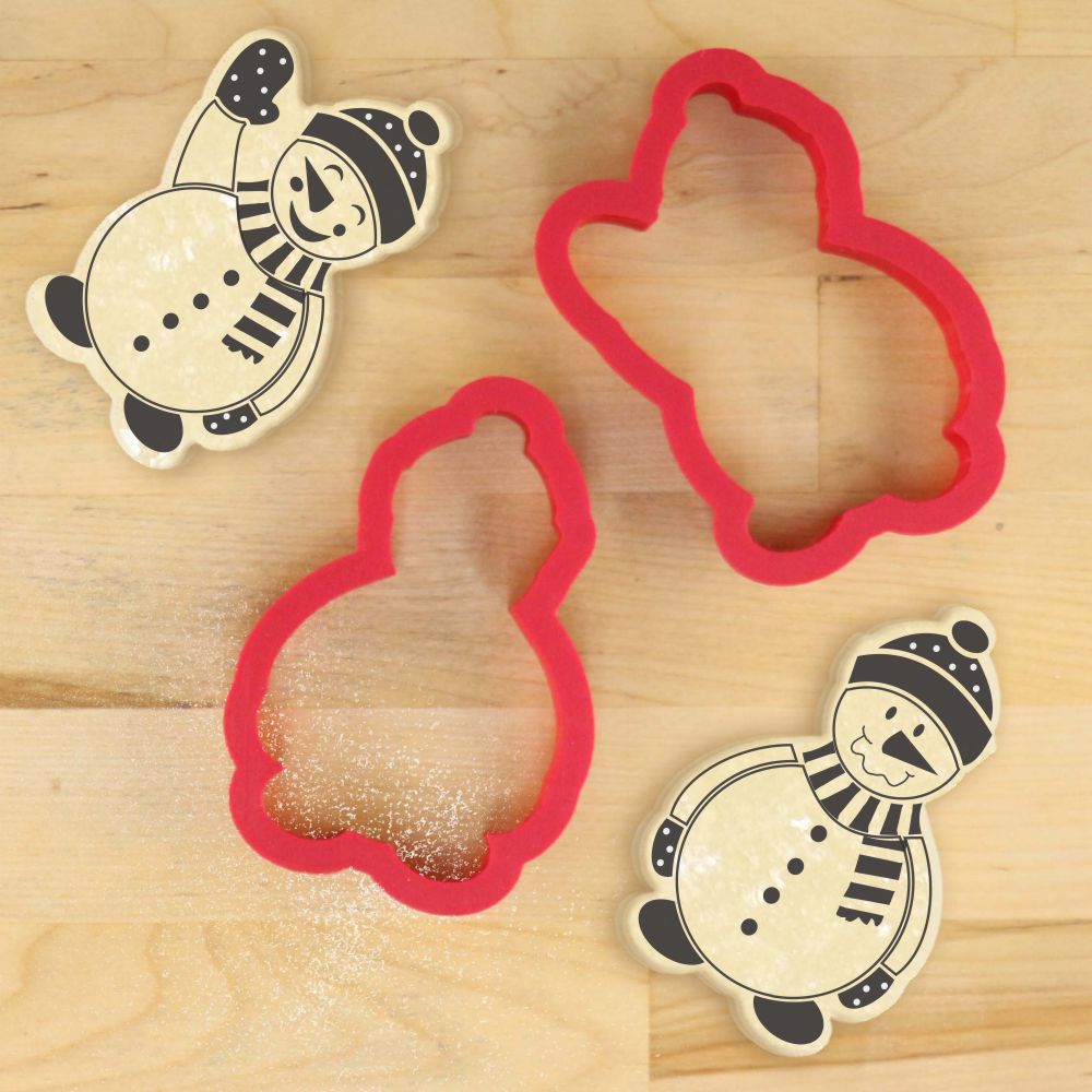Snowman cookie cutters set in red and black for holiday baking and cookie stenciling.