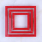 Nested square cookie cutter set in red, featuring three graduated sizes: 2", 3", and 4", ideal for baking and crafting stencils.