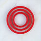 Nested Circle Cookie Cutter Set in red, featuring three graduated sizes: 2", 3", and 4". Ideal for baking and stenciling.