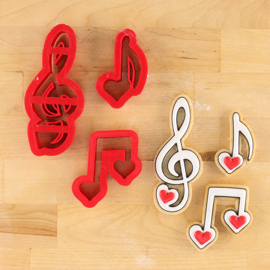 Music Note Cookie Cutters next to Valentine's Day Music Note shaped cookies for a "Love Notes" theme Valentine's Day