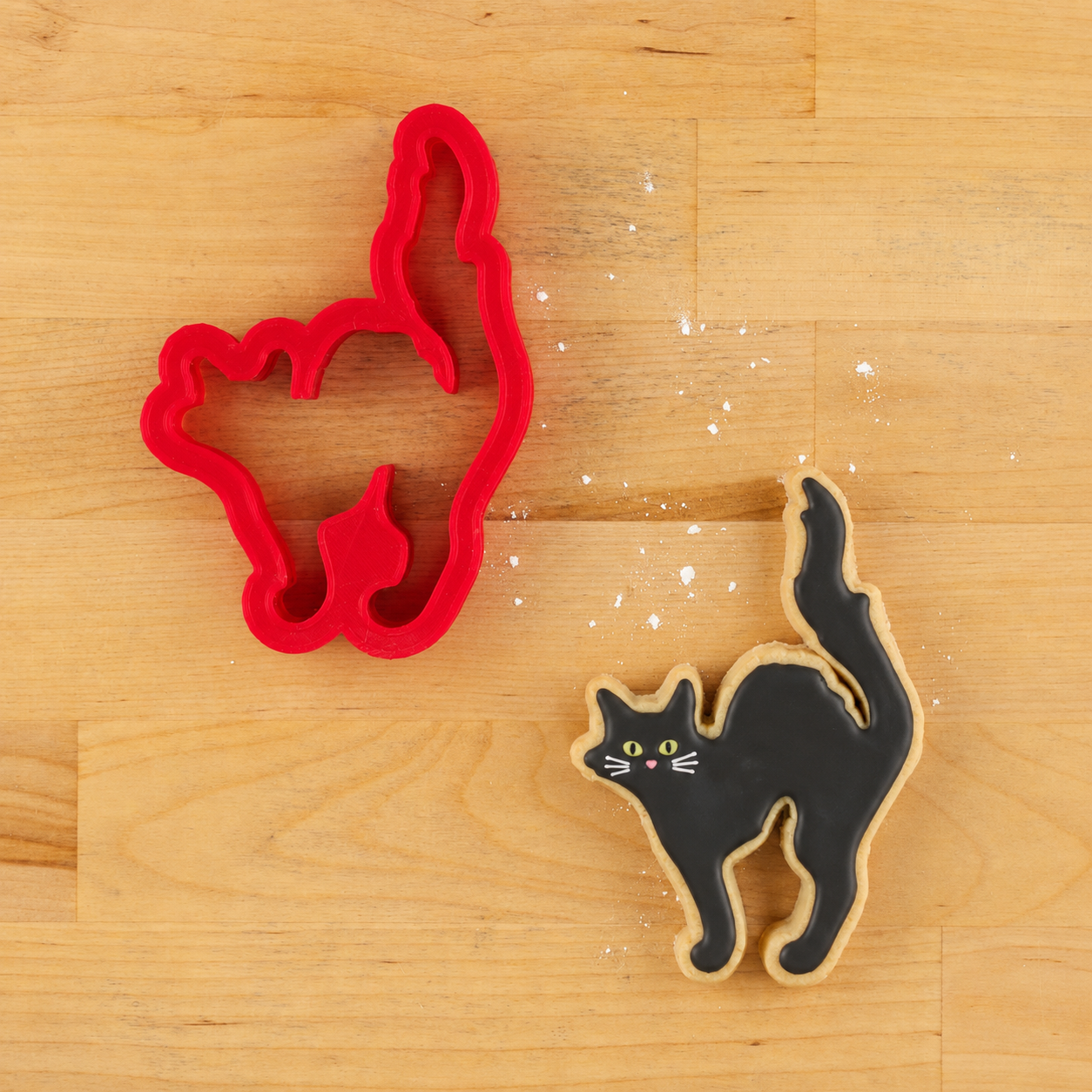 Black Cat Cookie Cutter and Cat shaped cookie for Halloween