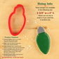 A cookie cutter set displayed on a light wood background with informational text. The set includes a red heart-shaped cutter and a green light bulb-shaped cutter, with text detailing sizing and product features.