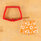 Swim Trunk cookie cutter stenciled with the Tropical Hibiscus Cookie Stencil