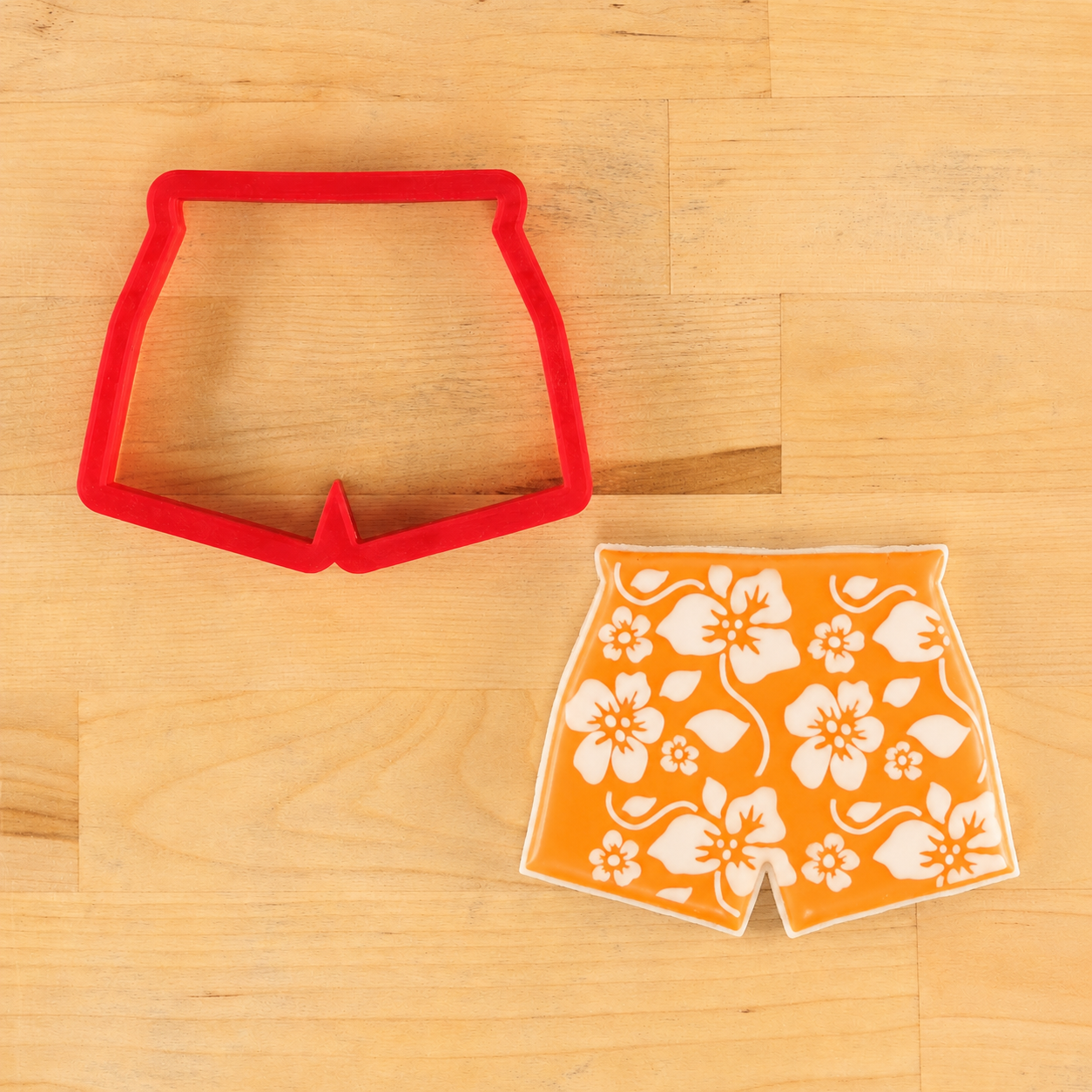 Swim Trunk cookie cutter stenciled with the Tropical Hibiscus Cookie Stencil