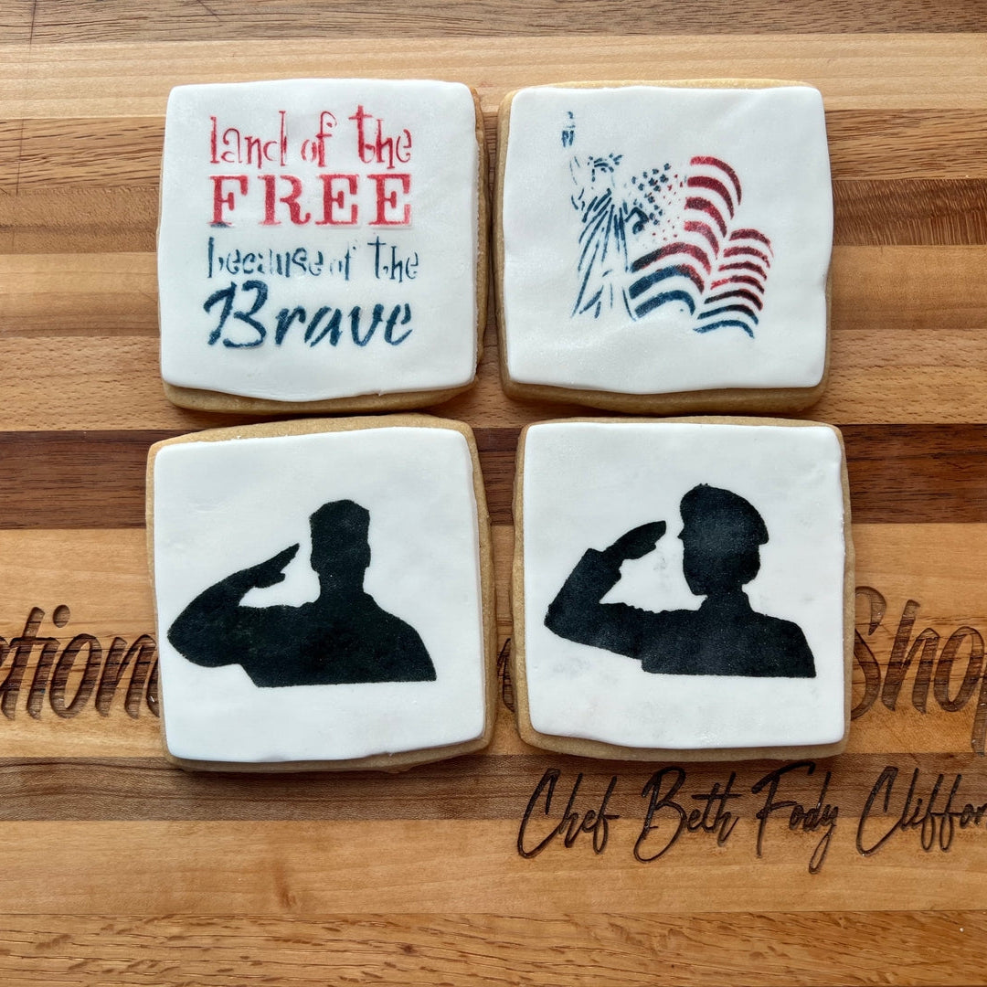 Decorative cookies with patriotic designs on a wooden surface.
