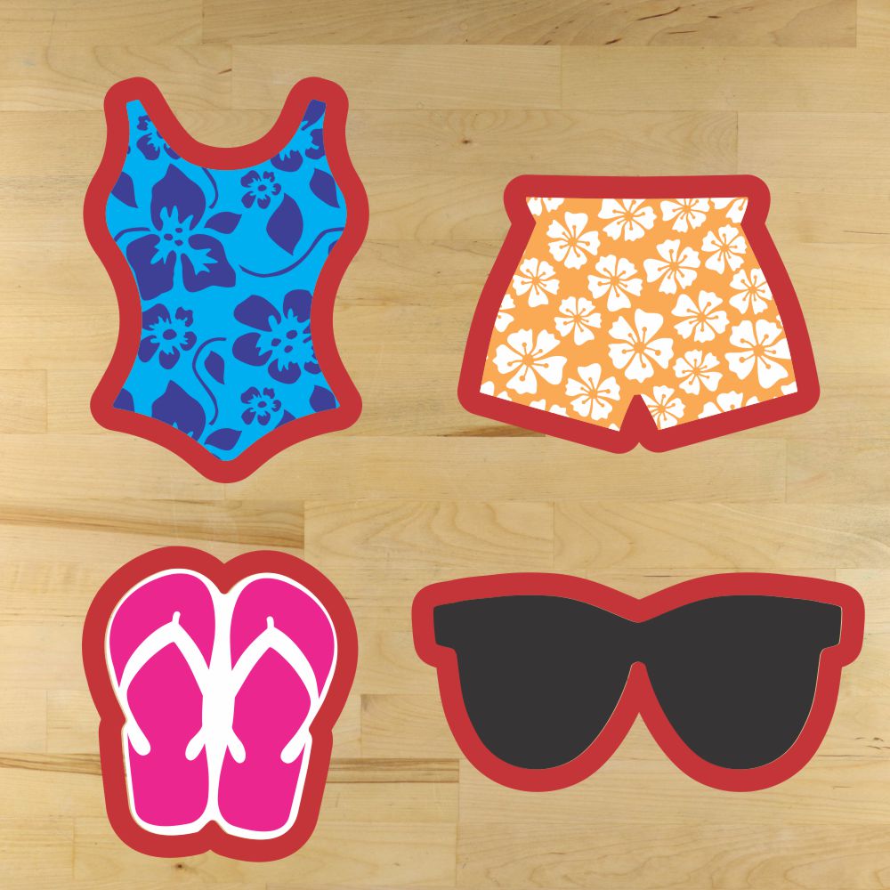 Decorated beach cookies made with swimsuit, swim trunks, flip flop, and sunglasses cookie cutters