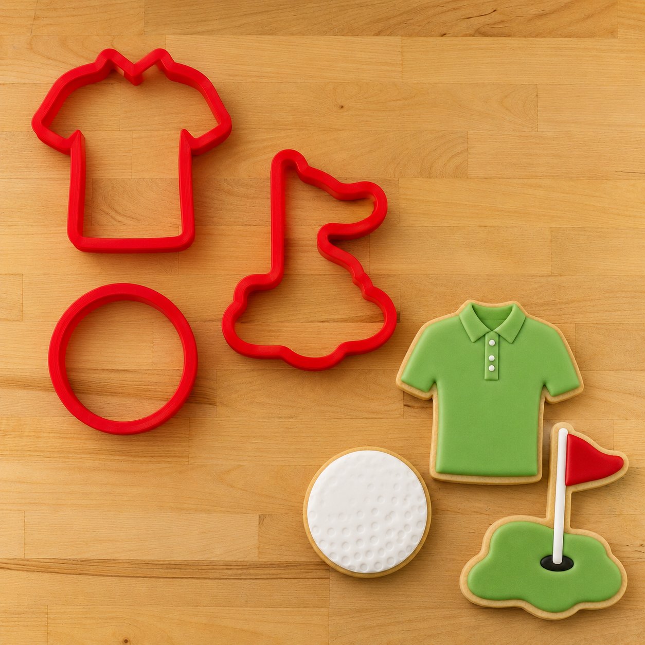 Golf Cookie Cutter Set and golf-shaped cookies that have been iced.