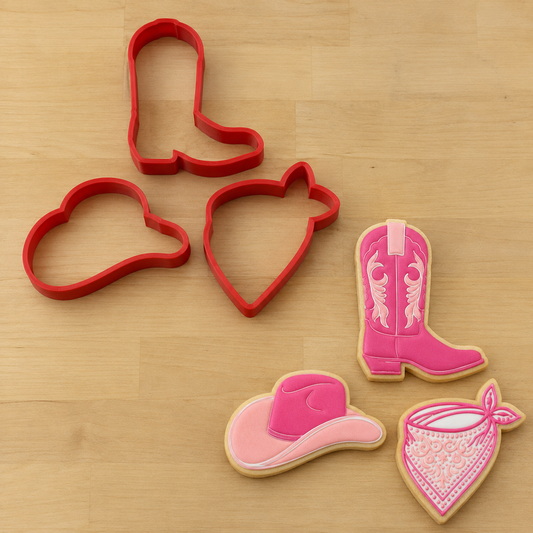 Cowgirl Cookie Cutter Set featuring a cowgirl hat, cowgirl boot and western bandana cookie cutters made from durable food-safe 3D printed plastic.