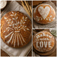 Three images of bread with decorative patterns and 'baked with love' text.