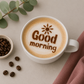 Good Morning stenciled onto a latte using a barista stencil from Confection Couture