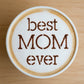 'Best Mom Ever' applied to the top of a coffee with cocoa powder