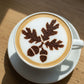 Fall Leaves stencil applied to the top of coffee with cocoa powder