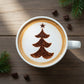 Christmas tree design applied to the top of coffee with cocoa powder
