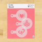 Set of cookie stencils on a pink sheet with 'Cookie Stencils' text and 'Confection Couture' branding.